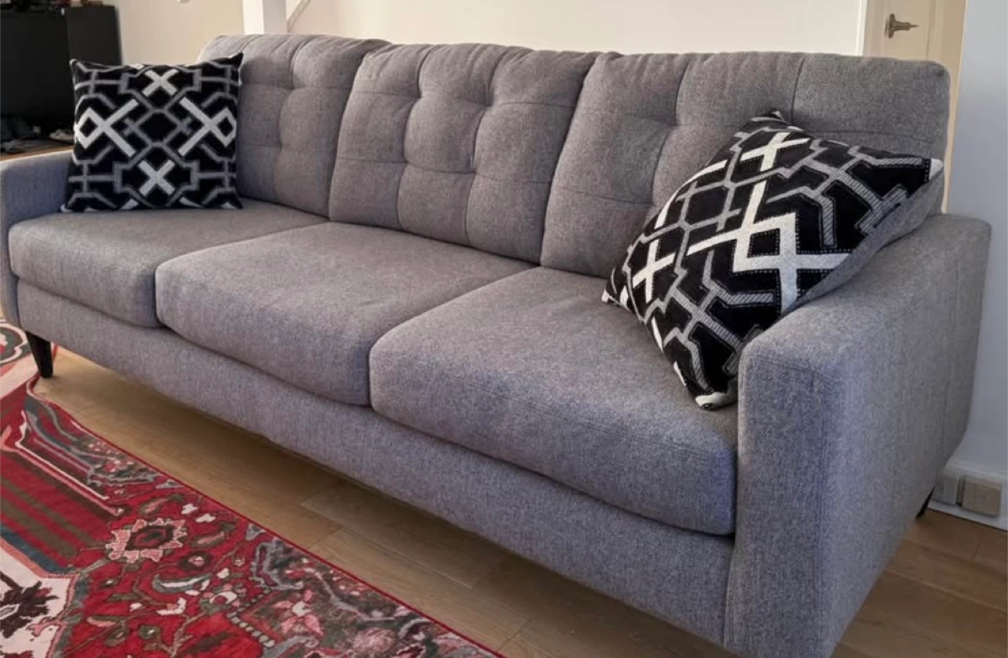 Grey Tufted Sofa with Geometric Pillows - photo 3
