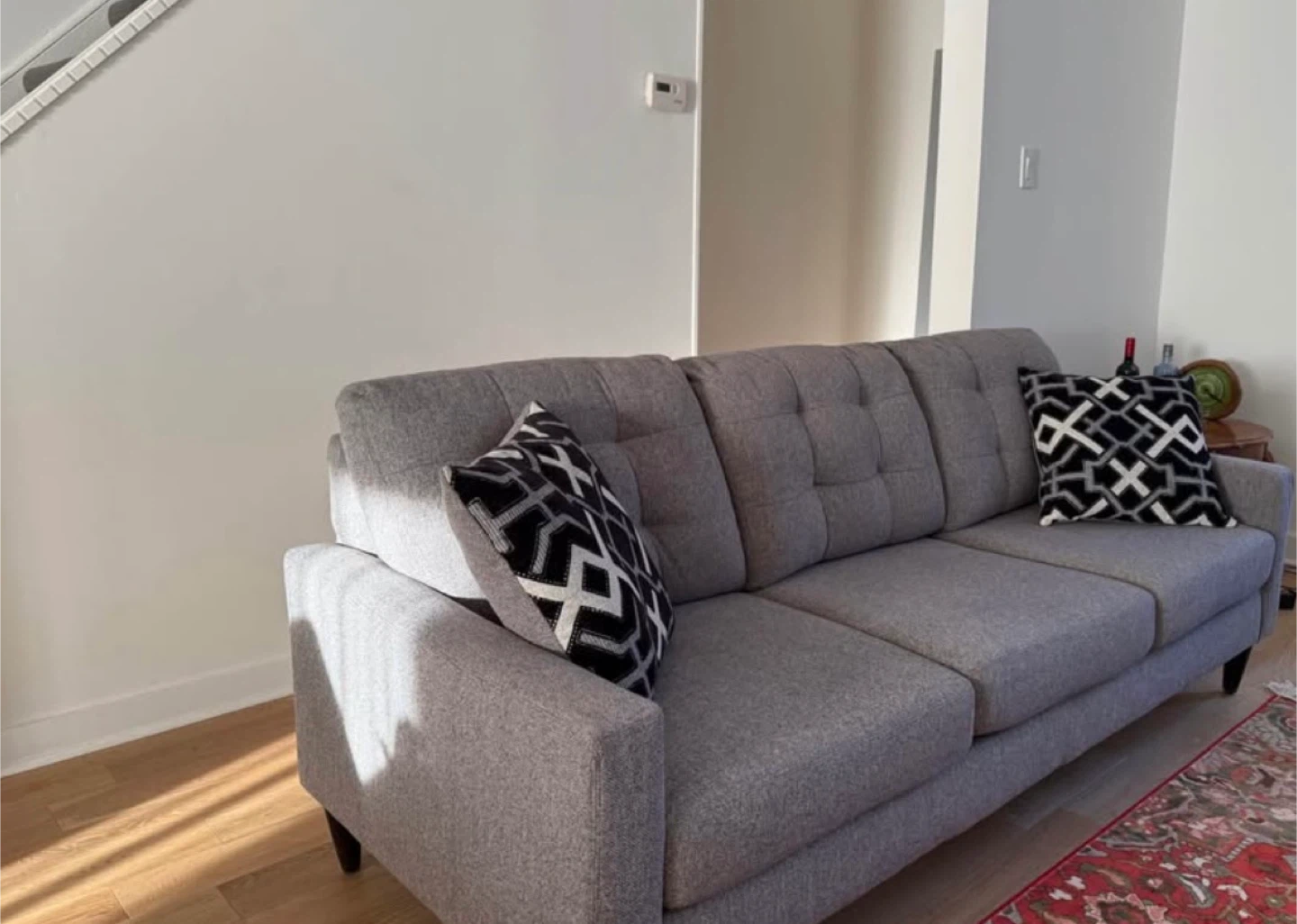 Grey Tufted Sofa with Geometric Pillows - photo 2