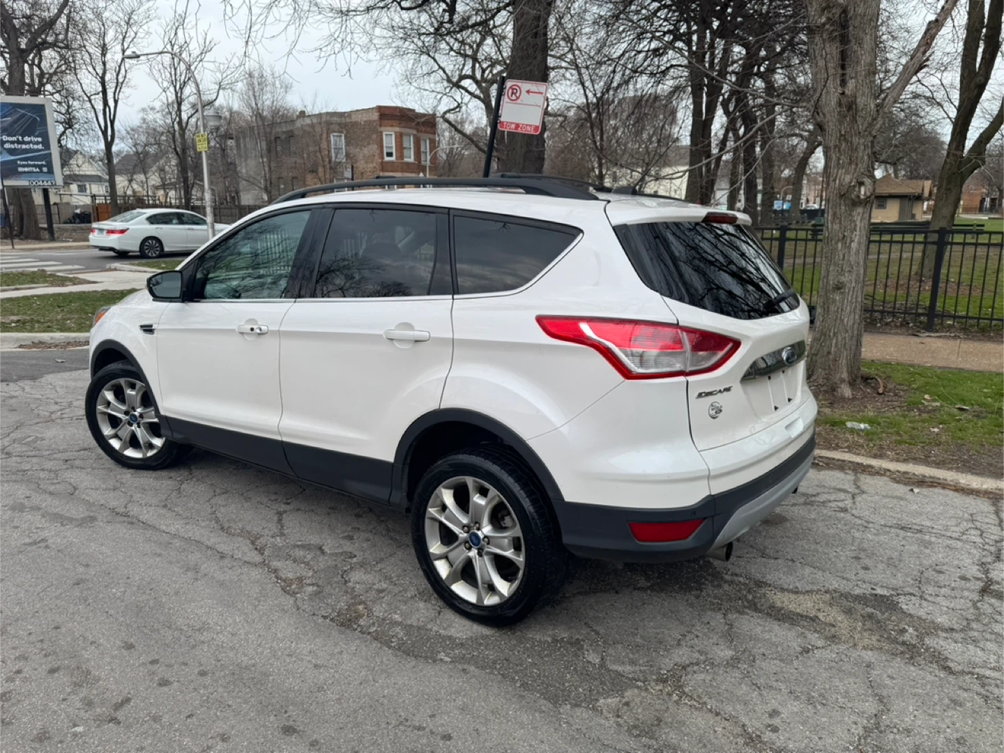 White Ford Escape SUV - photo 2
