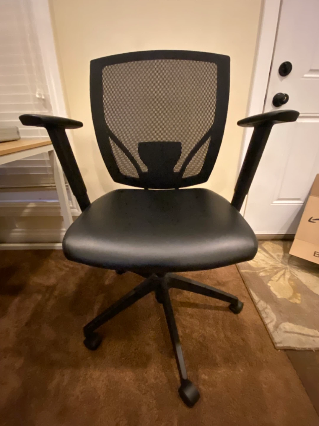 black leather and mesh office chair