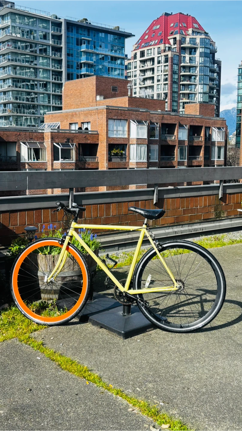 Yellow Single Speed Bicycle with Orange Rims