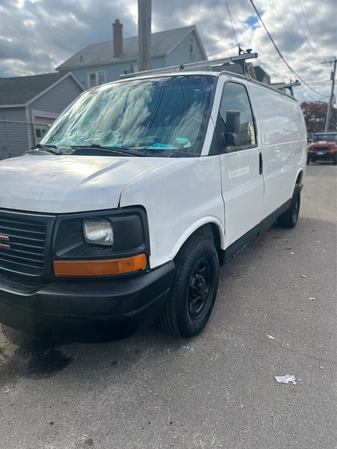 White GMC Cargo Van