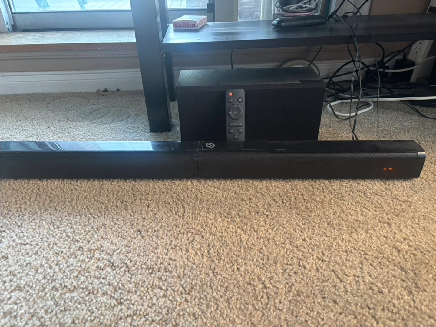 Black Soundbar and Subwoofer with Remote