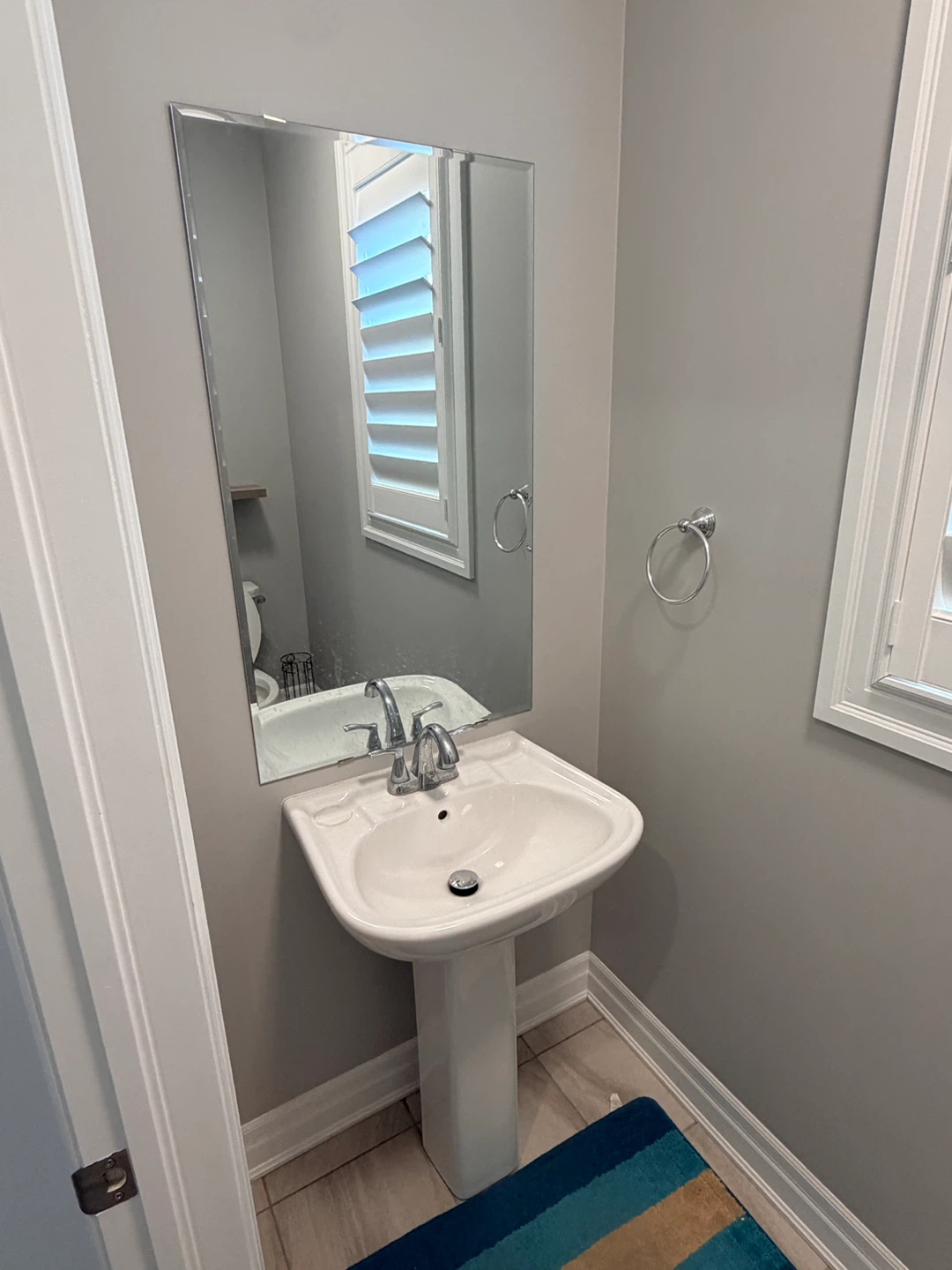 White Pedestal Sink + Vanity Mirror