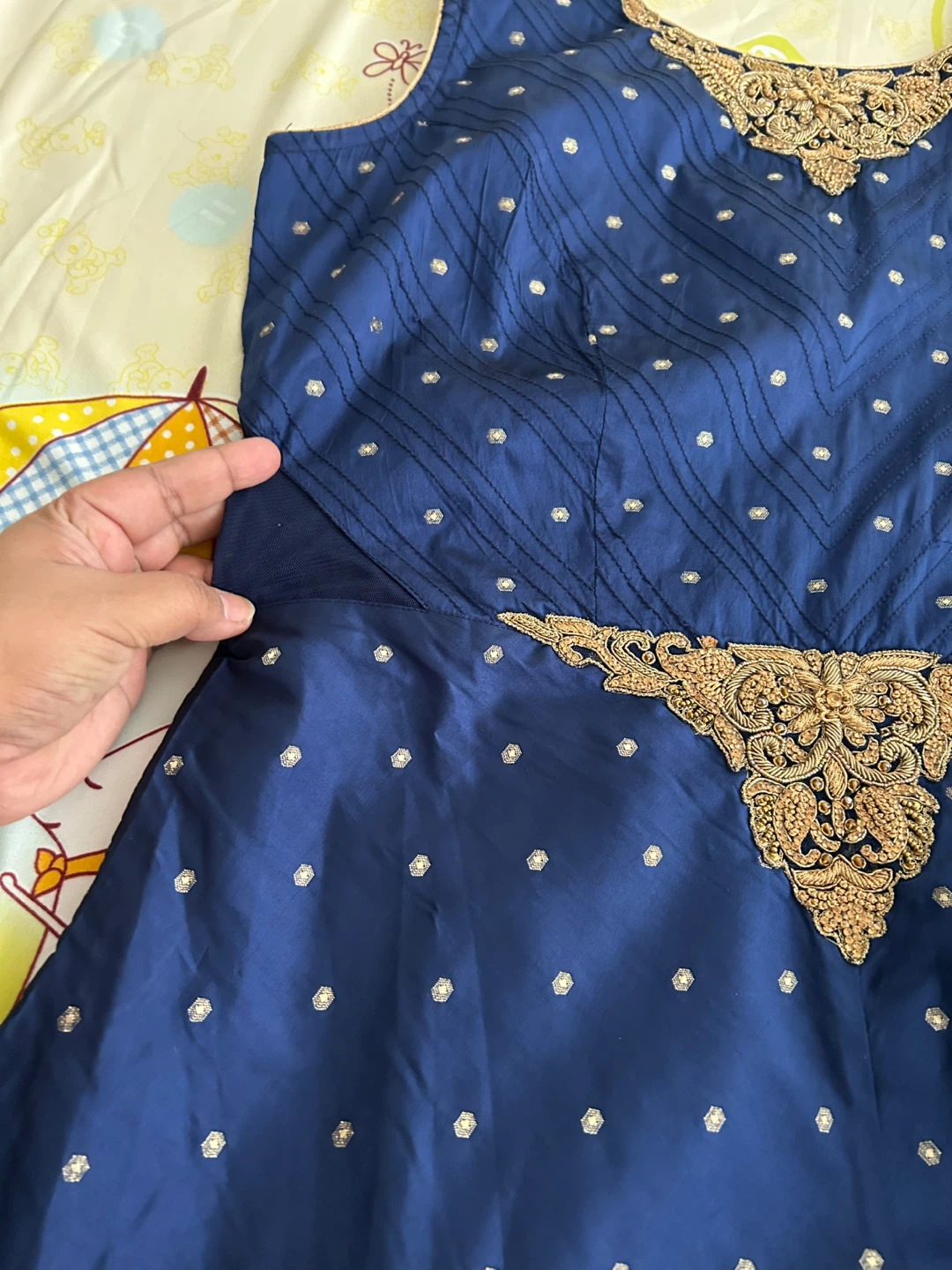 Blue Sleeveless anarkali dresss with Gold Embellishments