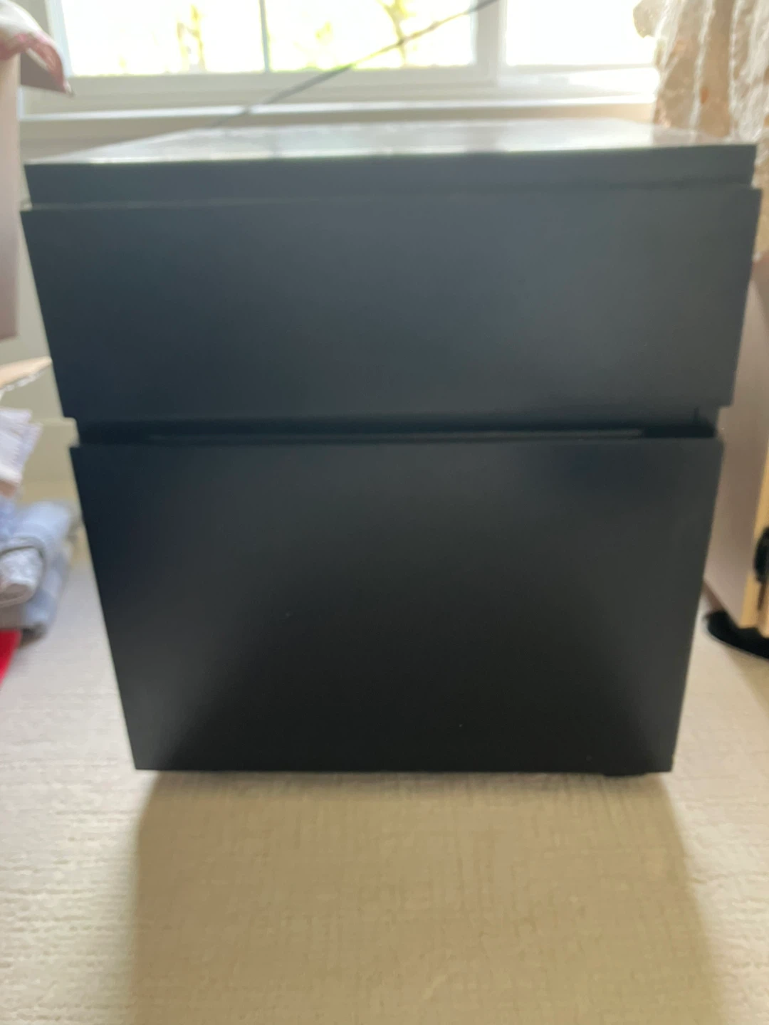 Black filing cabinet drawer with hanging file holders