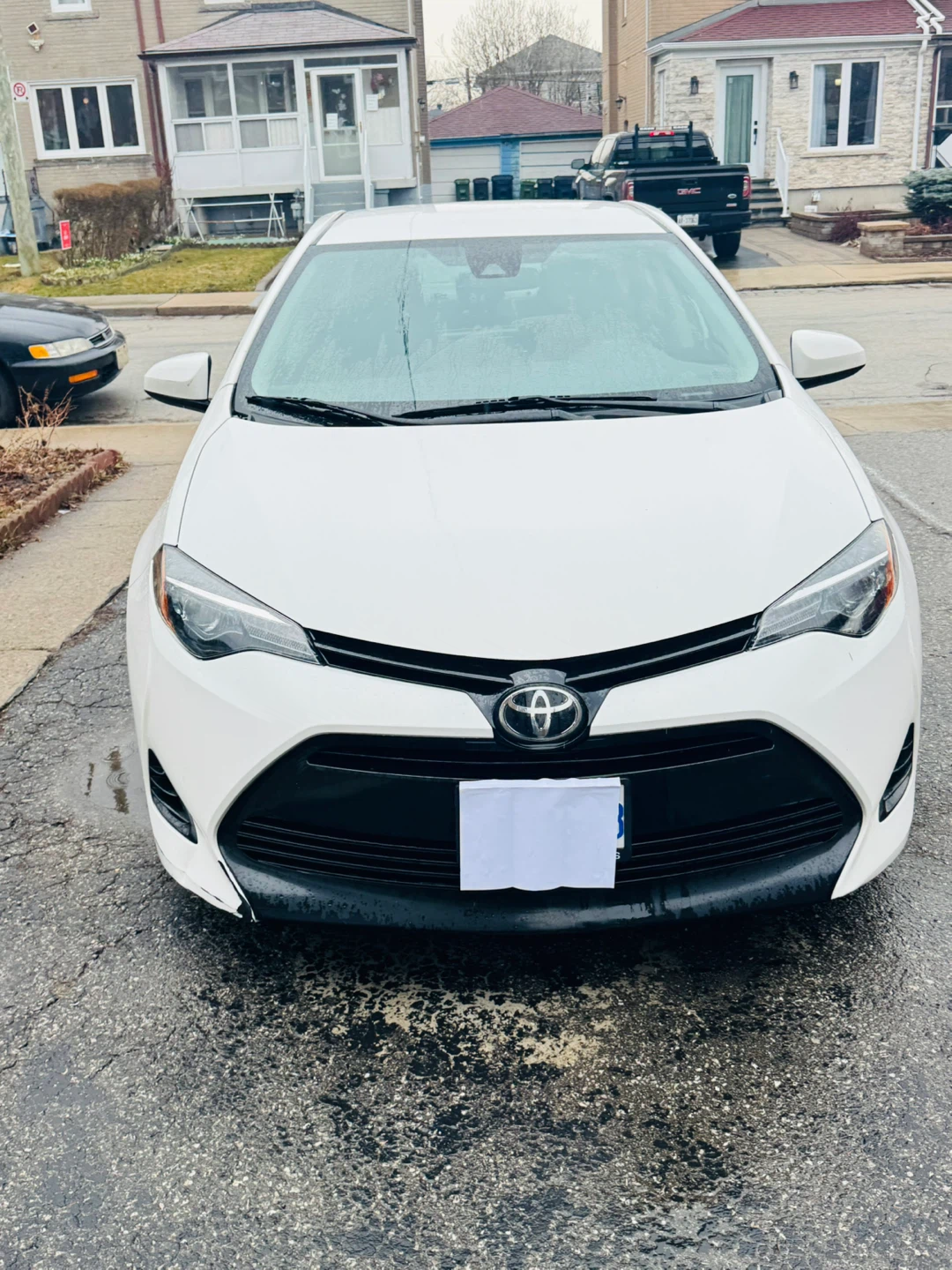 White Toyota Corolla Sedan