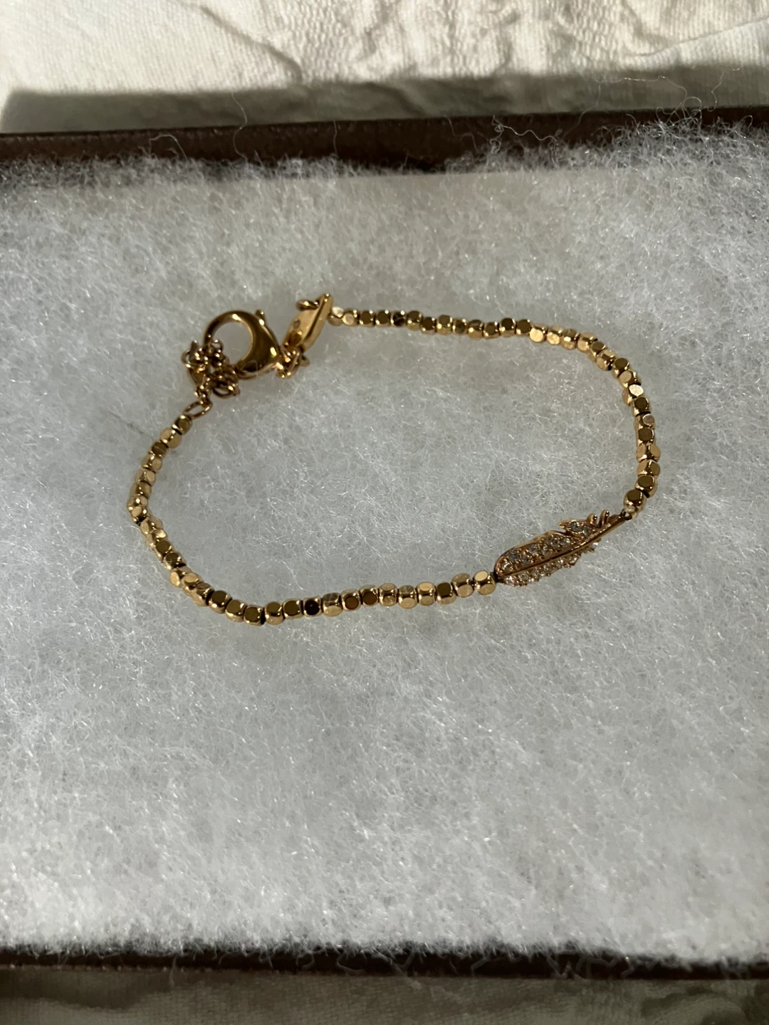 Gold Tone Beaded Bracelet with Feather Charm