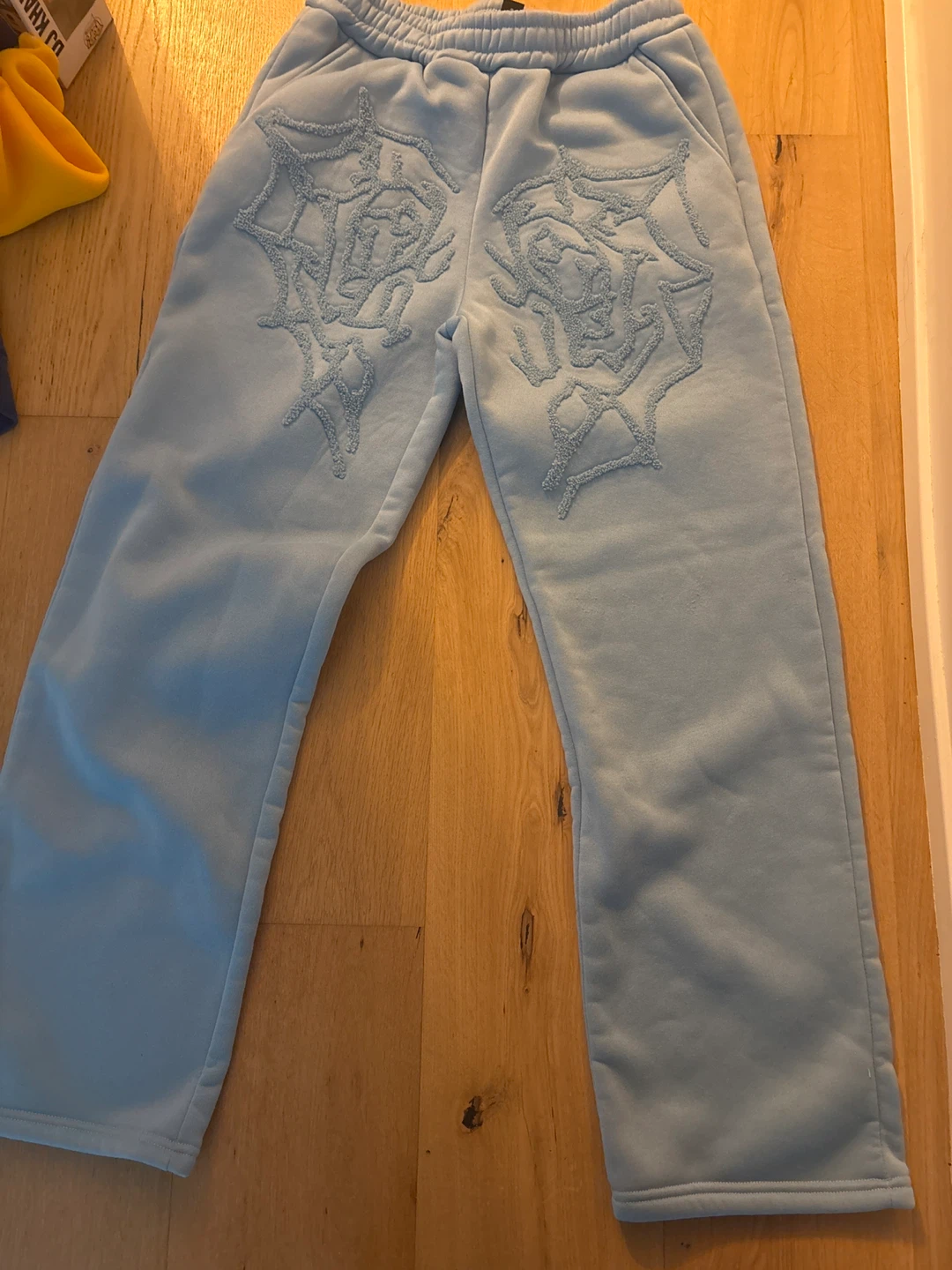 Light Blue Sweatpants with Raised Pattern