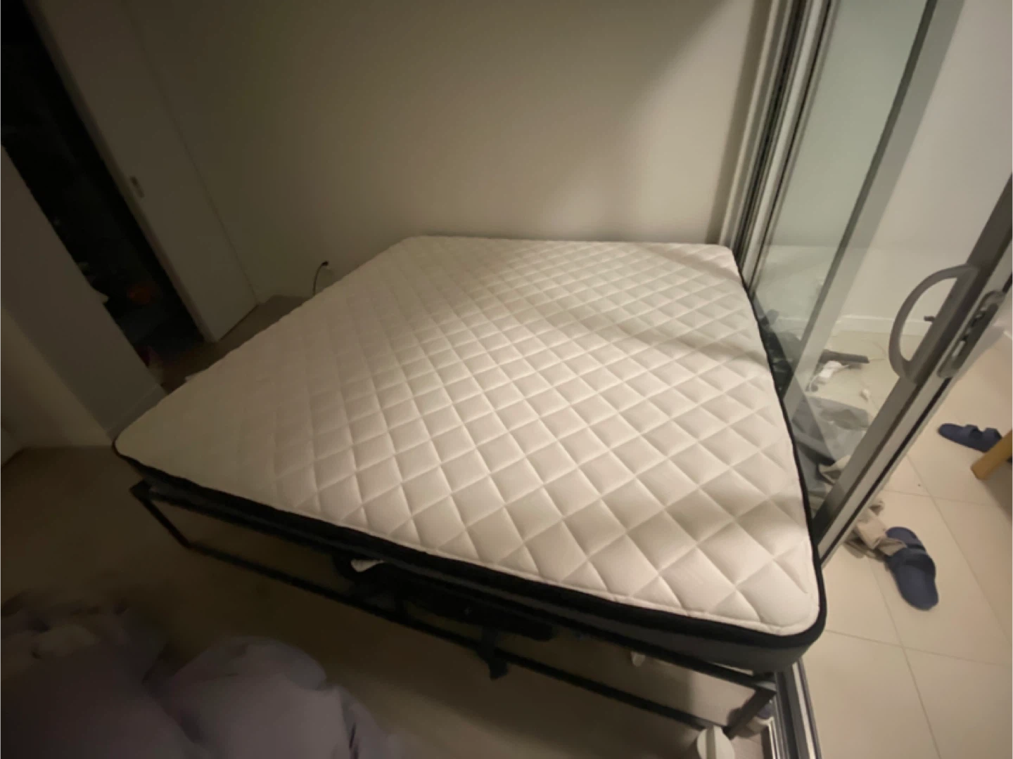 King size mattress with metal bed frame and bedsheets - photo 2