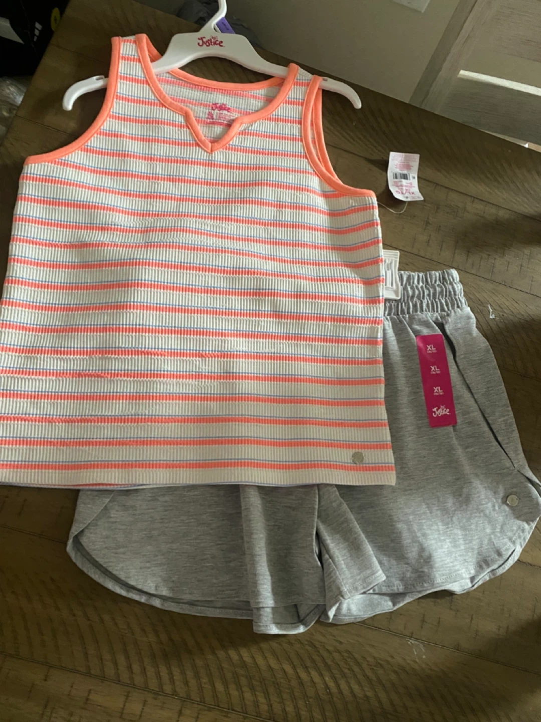 Brand new tank top and shorts with tag size 18 years old