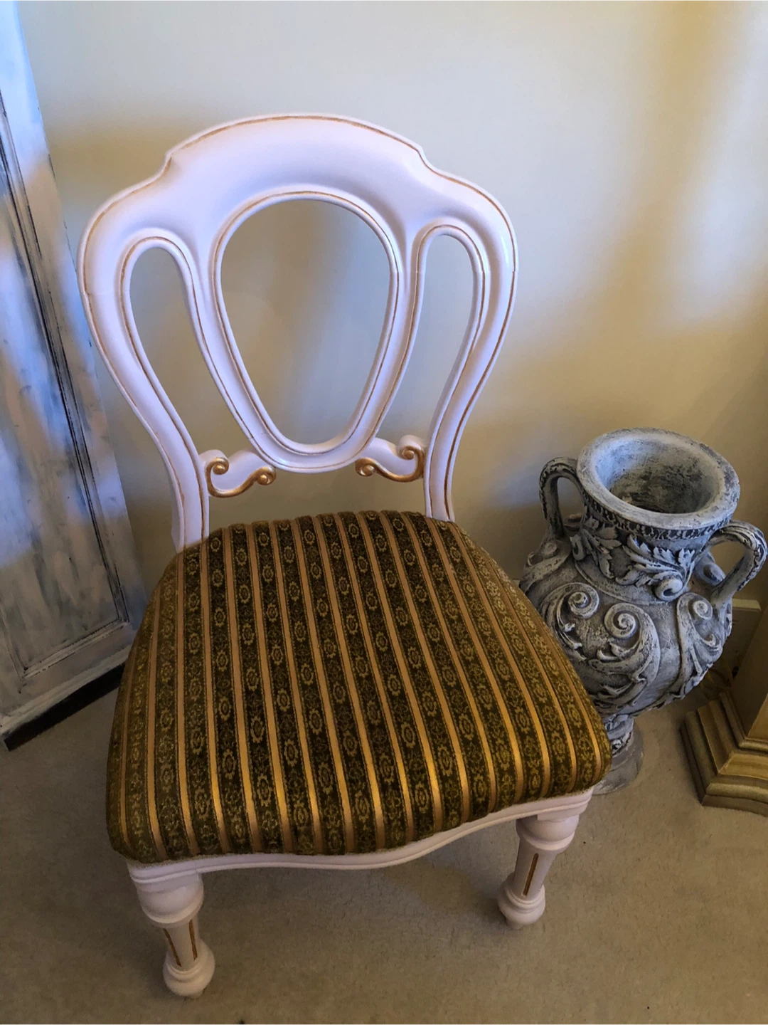 $115  Ornate Accent Chair with Striped Upholstery