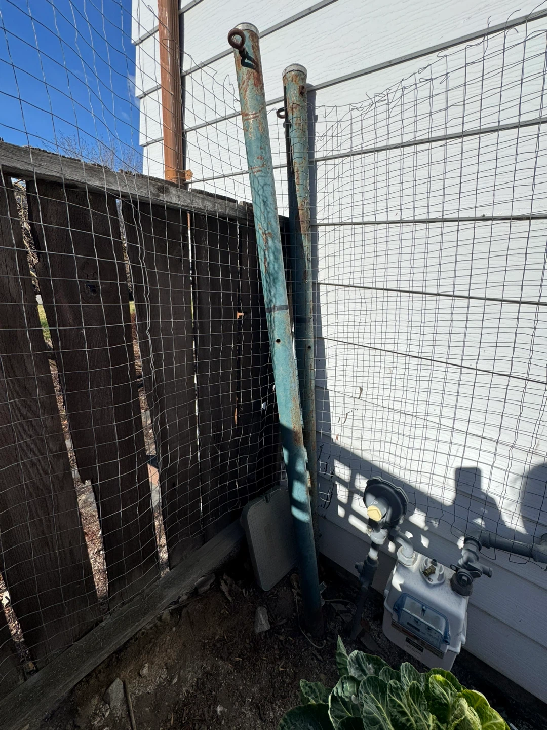 Two metal poles