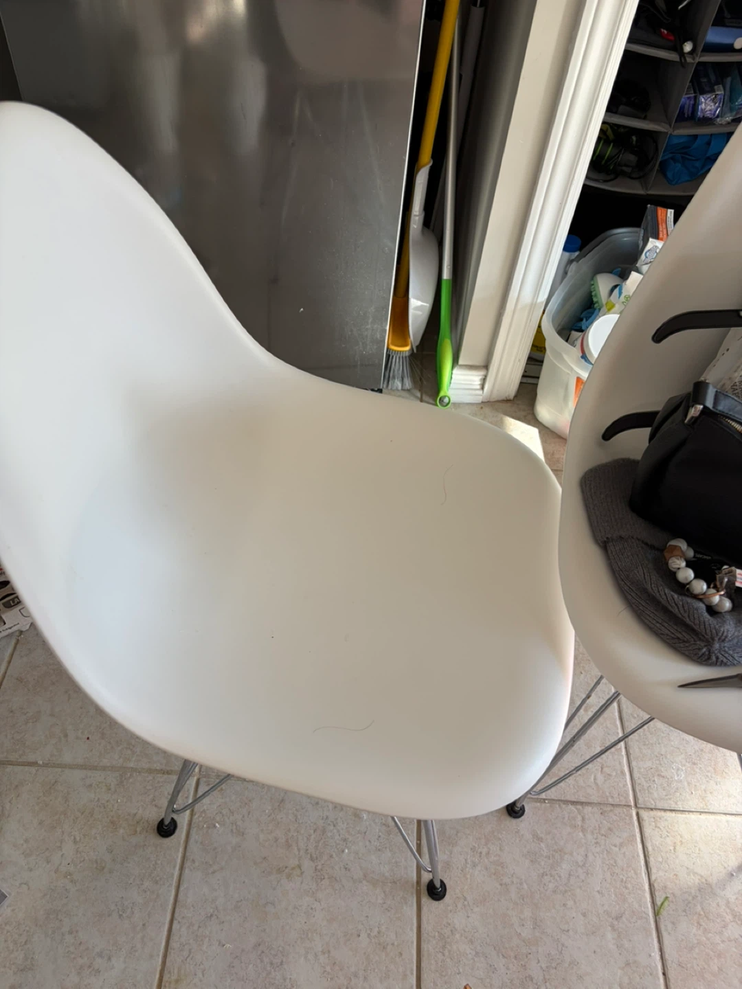Two white dinning chairs and free round table