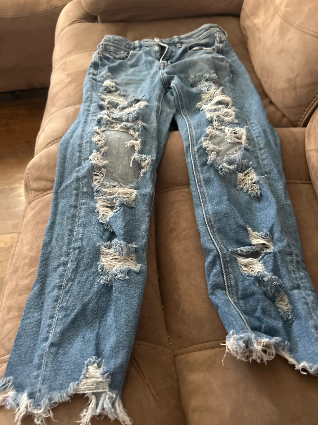 Distressed Blue Denim Jeans