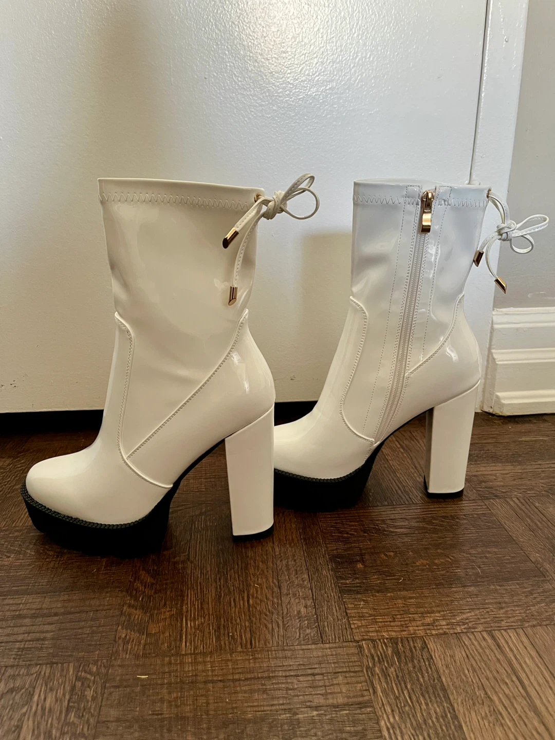 White platform heeled booties