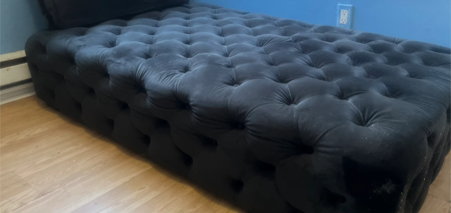 Article Black Tufted Ottoman with Pillow