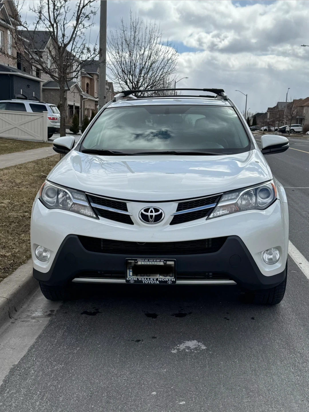 White Toyota RAV4 Limited AWD SUV
