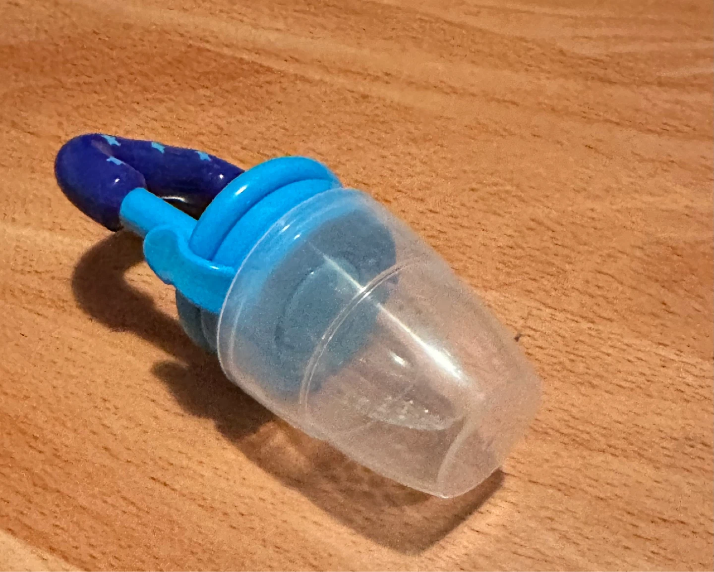 Blue baby feeder with stars