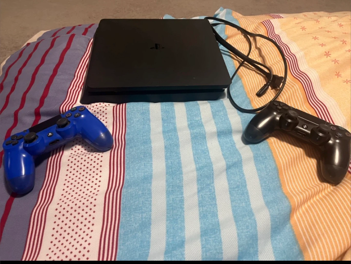 Sony PlayStation 4 Slim 1tb with 2 controllers
