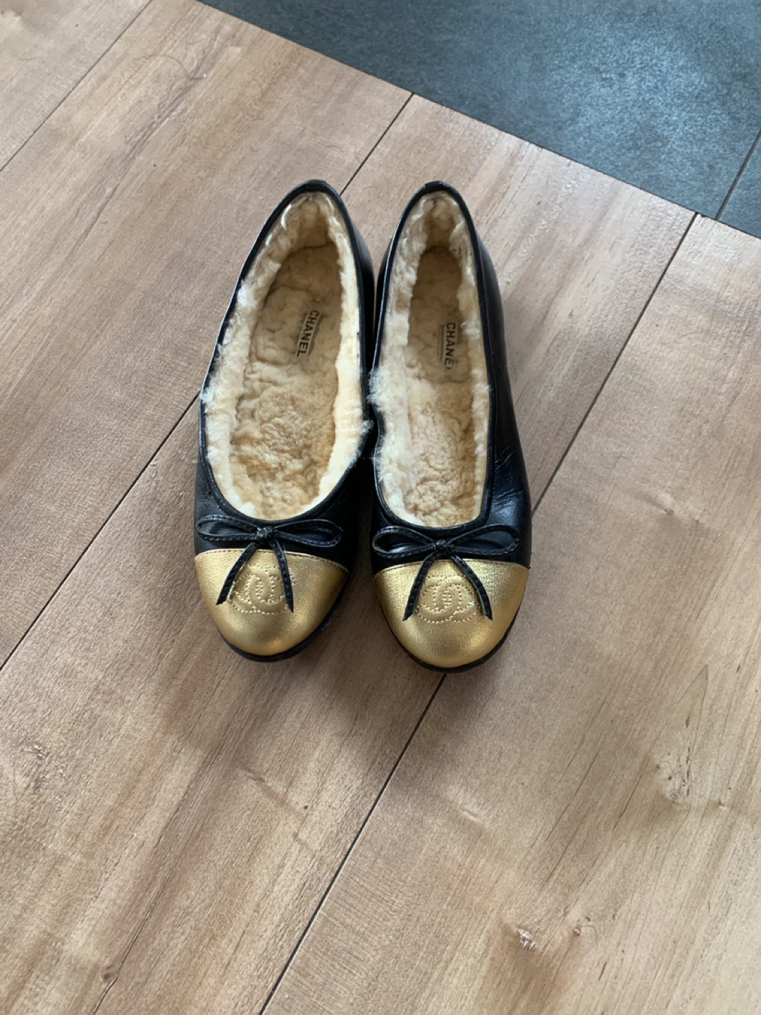 Chanel Black Leather & Gold Cap Toe Ballerina Flats