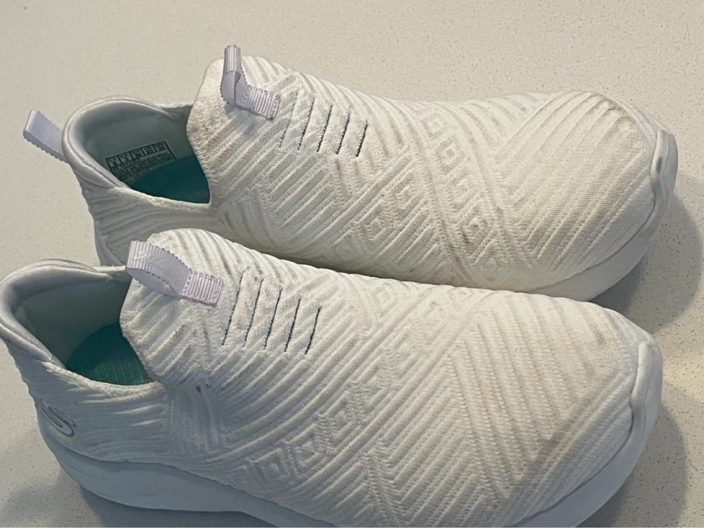 White Skechers Air-Cooled Foam Slip-On Sneakers