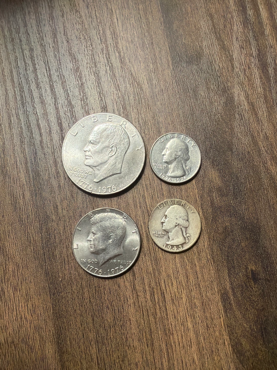 Collection of US Coins: Dollar, Half Dollar, Quarters