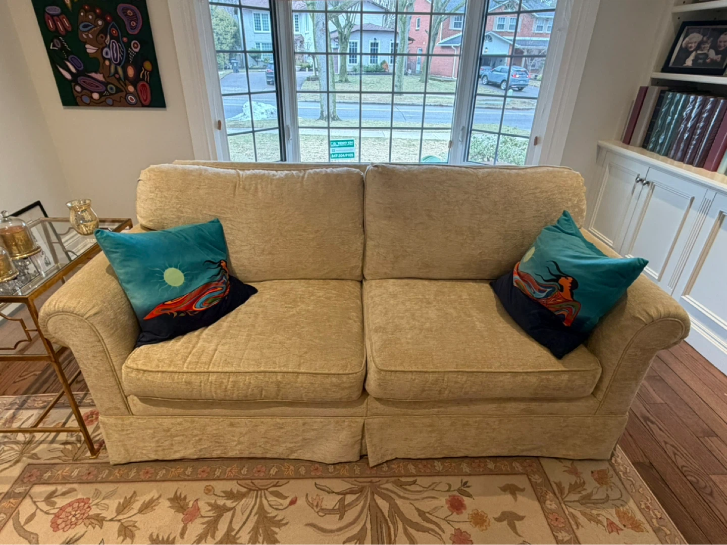 Cream coloured loveseat sofa