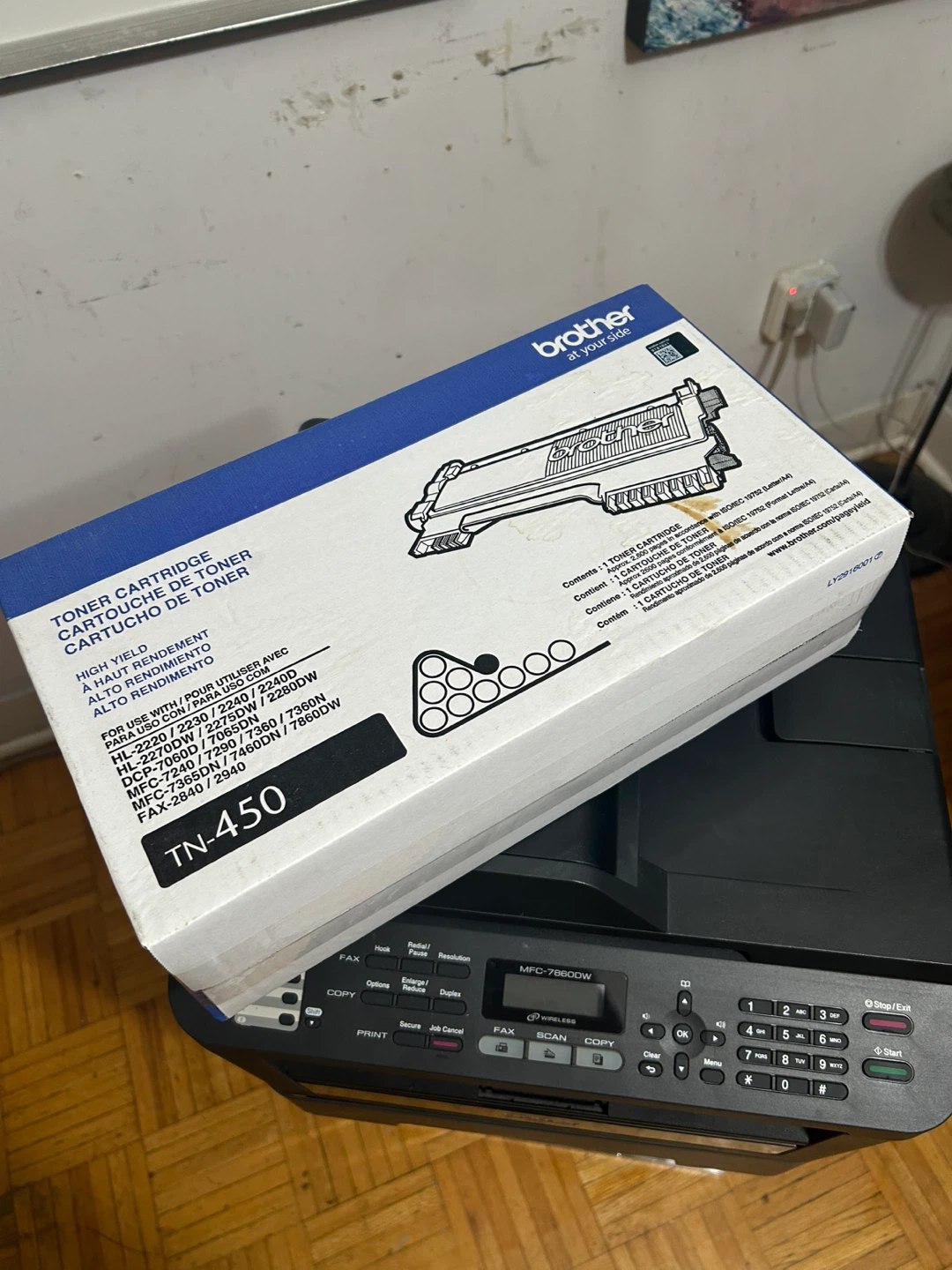Brother All-in-One Printer and Extra Toner Cartridge.