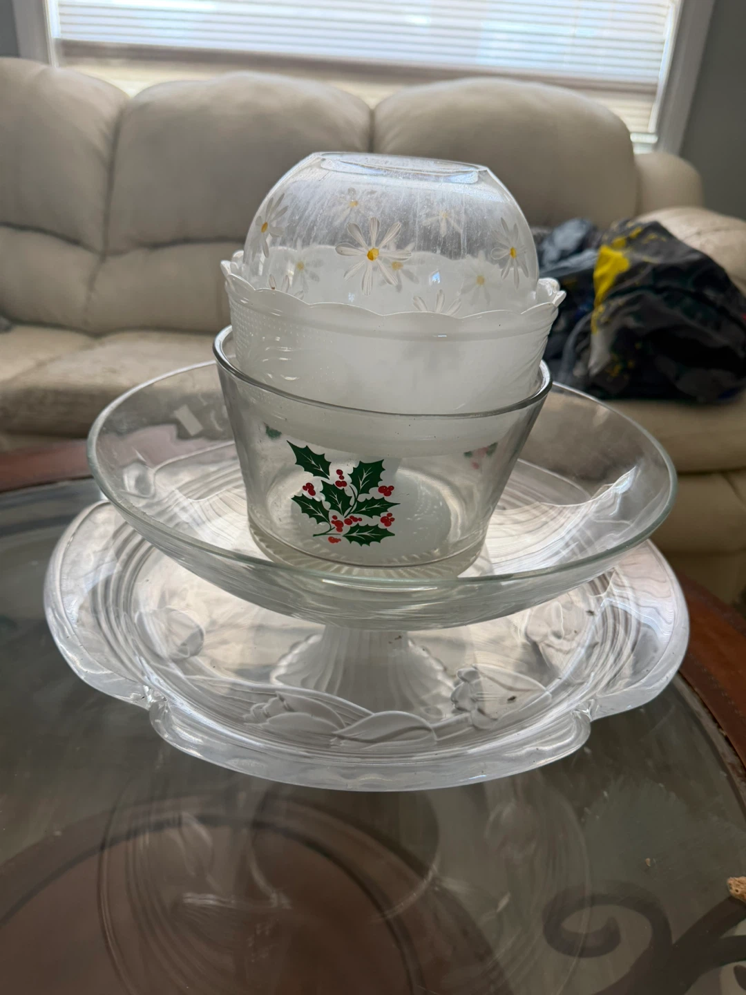 Collection of decorative glass bowls and cake stand