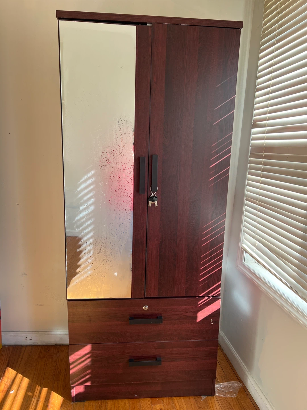Closed Armoire with Hanging Rod and Drawers