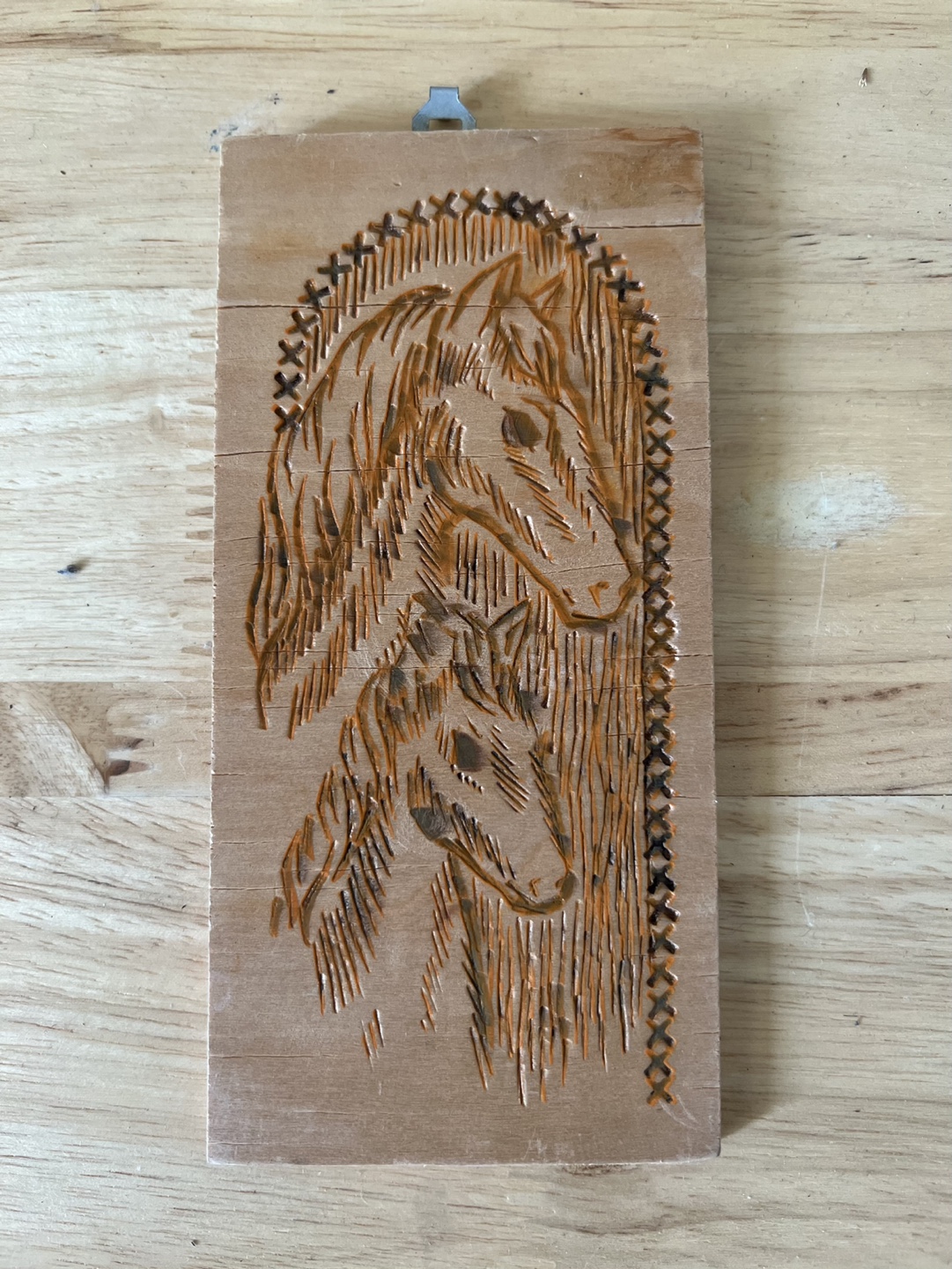 Carved wooden plaque with horses - 6” x 3”
