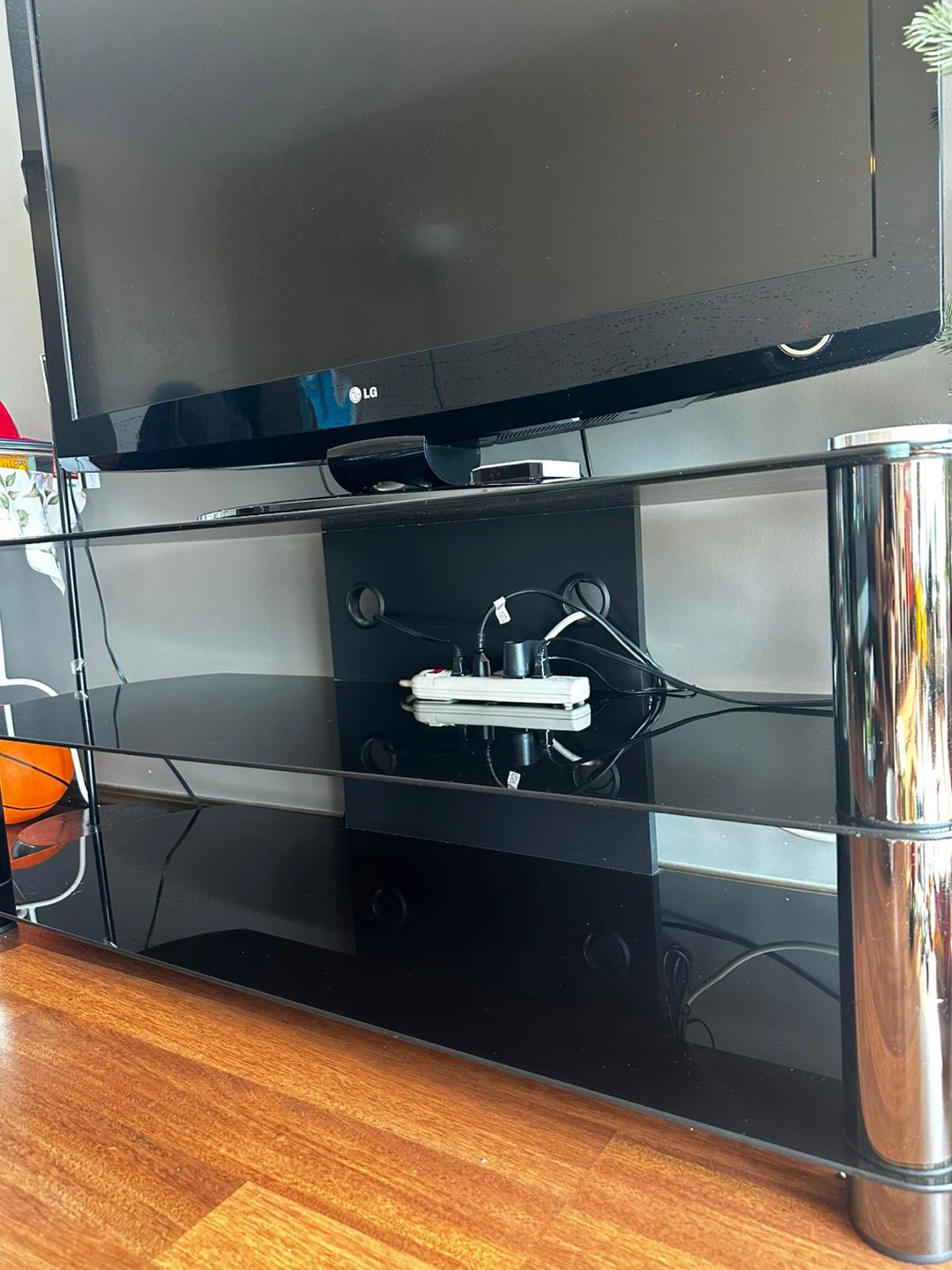 MOVING OUT SALE Black Glass TV Stand with Chrome Legs include TV - photo 4
