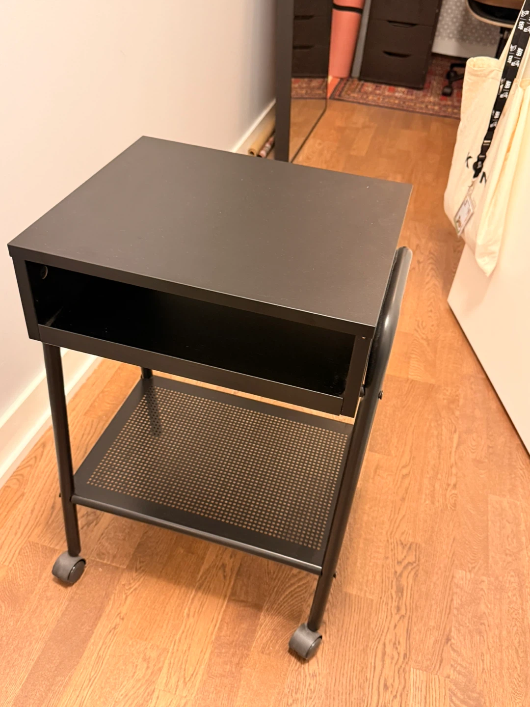 IKEA Black Nightstand with Shelves and Wheels