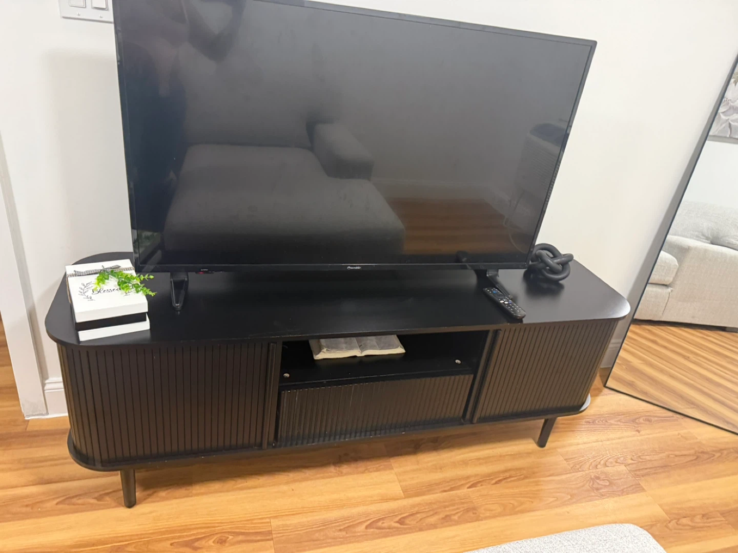 Modern Black Media Console with Slatted Doors