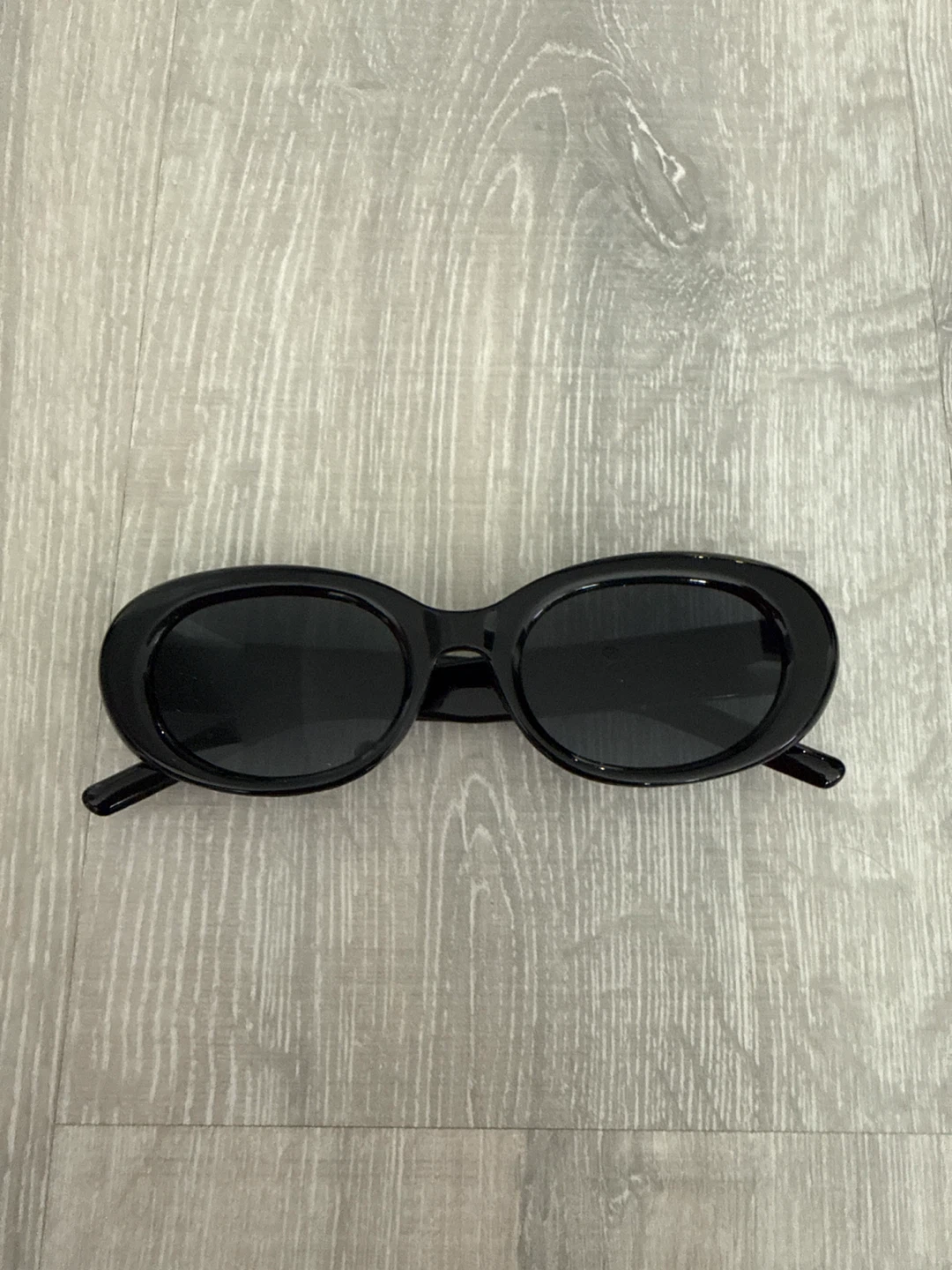 Black Oval Sunglasses with Star Detail