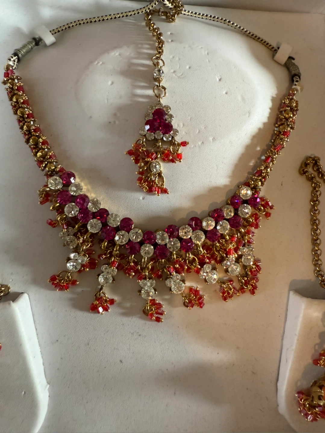 Gold Tone Indian Jewelry Set with Red and Clear Stones