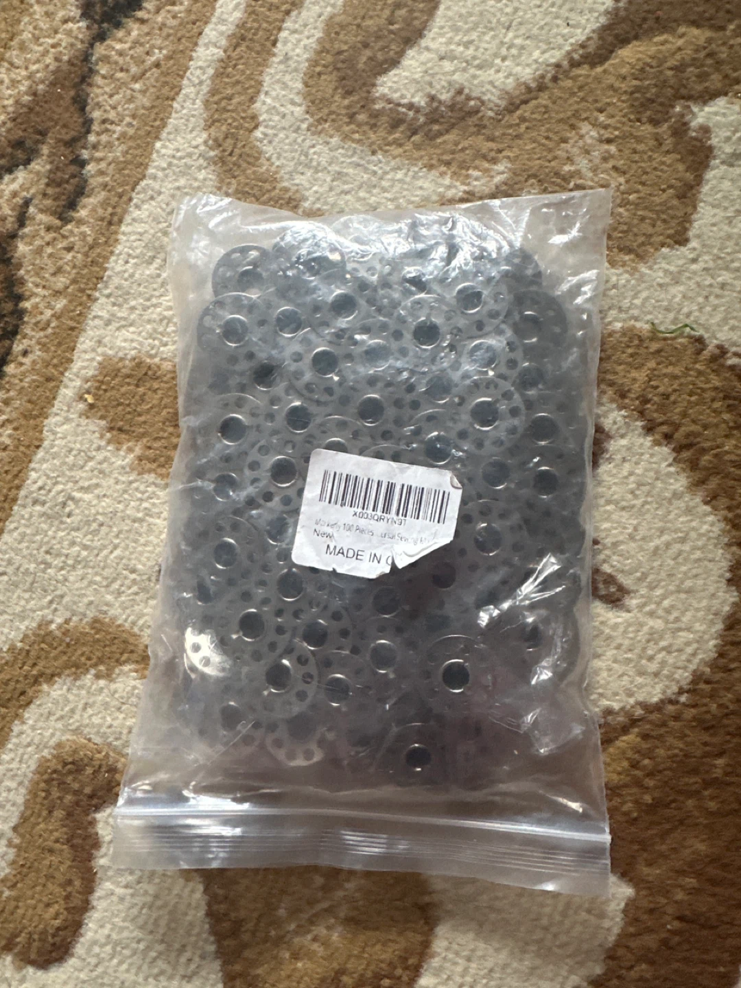 Bag of 75 Metal Bobbins in $12