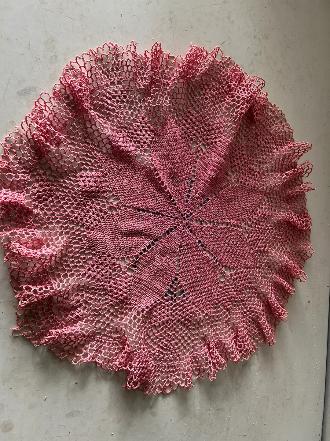 Pink crocheted doily