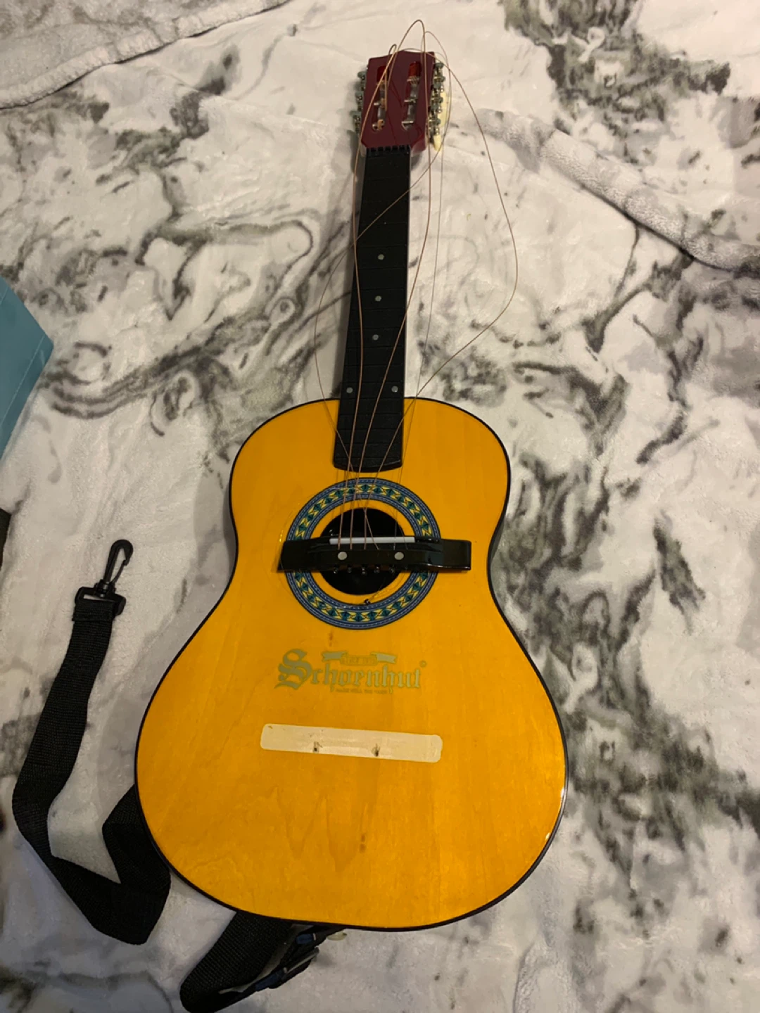 As is Schoenhut Guitar for kids