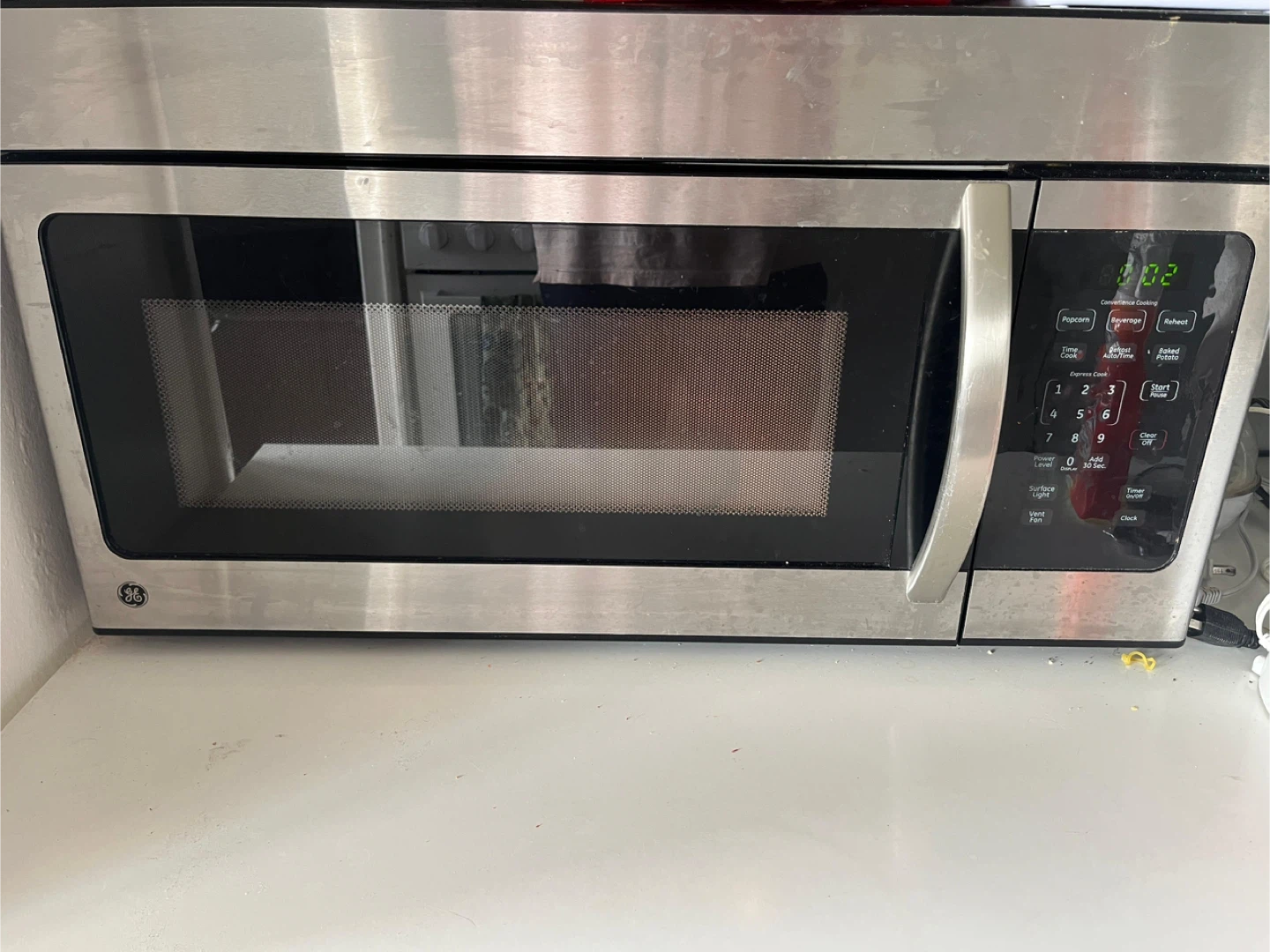 GE Stainless Steel Over-the-Range Microwave - photo 2