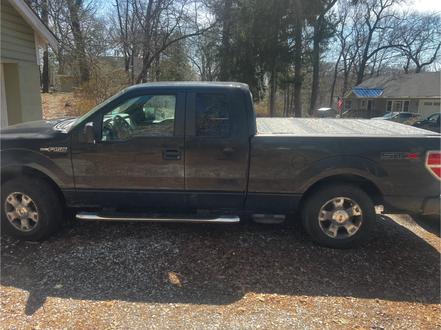 Black Ford F-150 STX Truck
