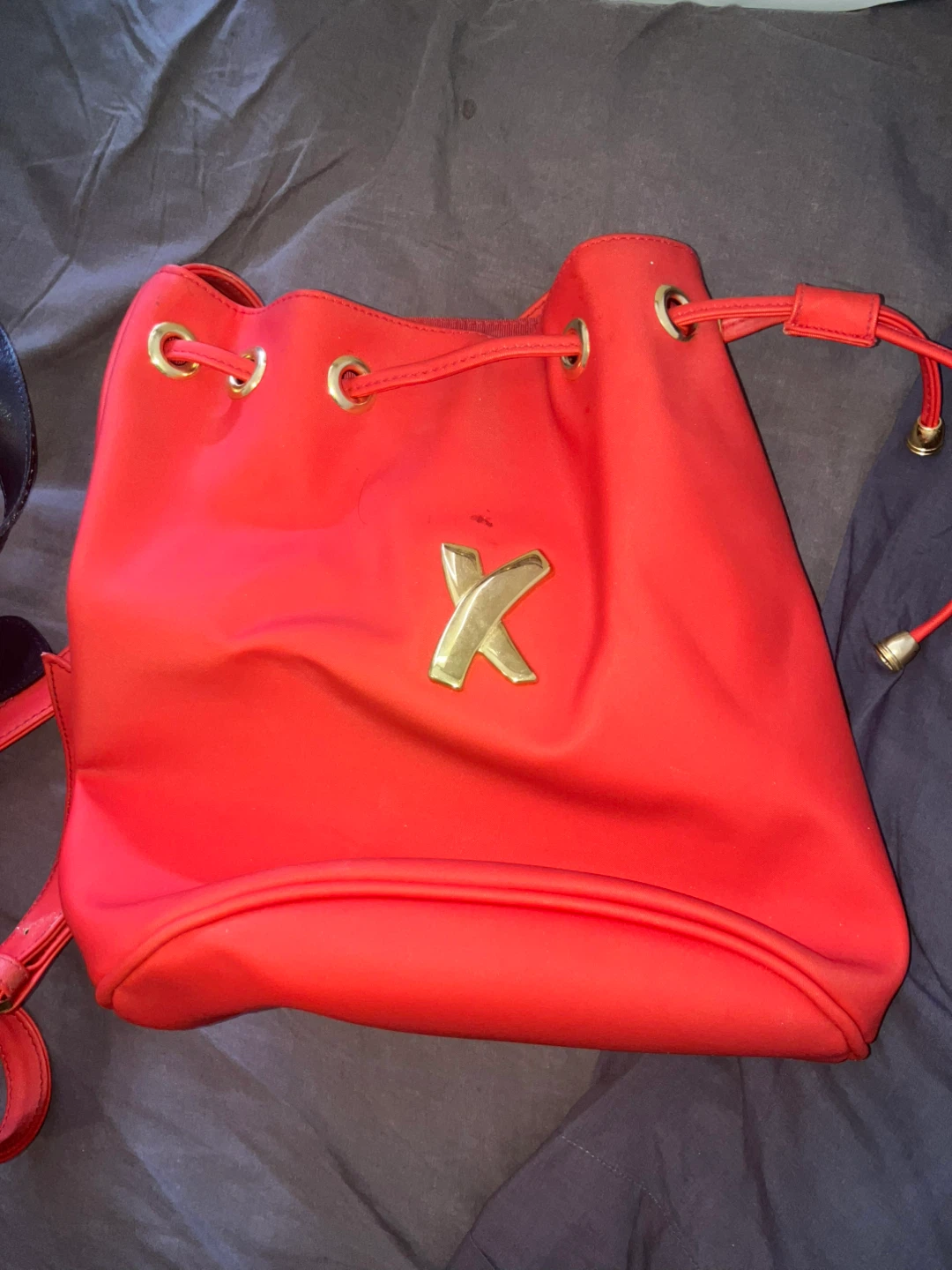 Red bucket bag with gold X logo - photo 2