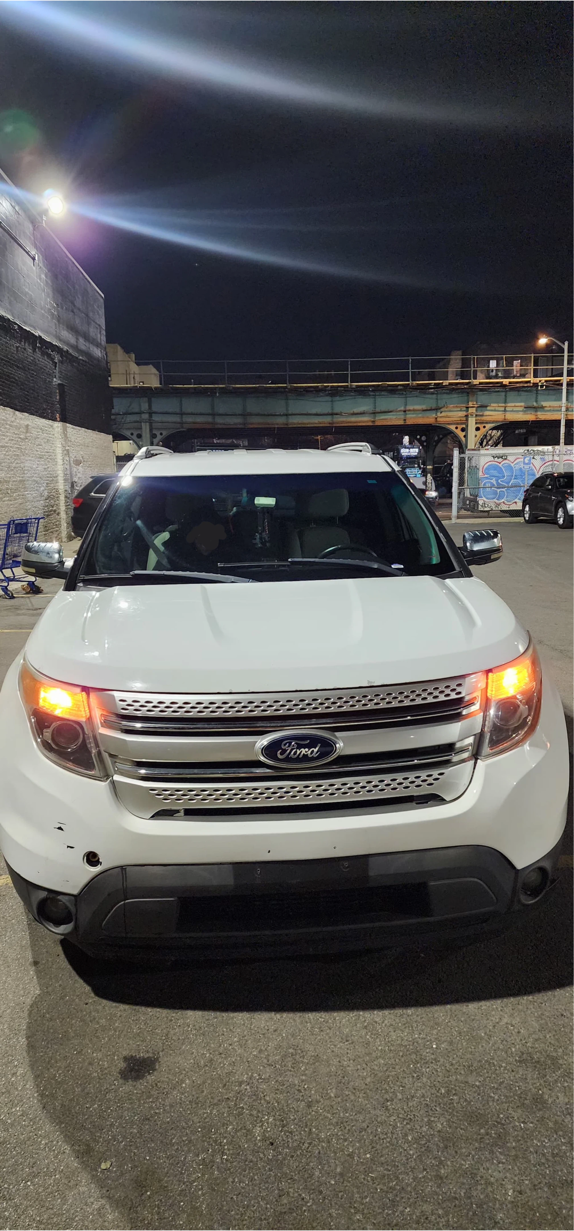 White Ford Explorer SUV - photo 2