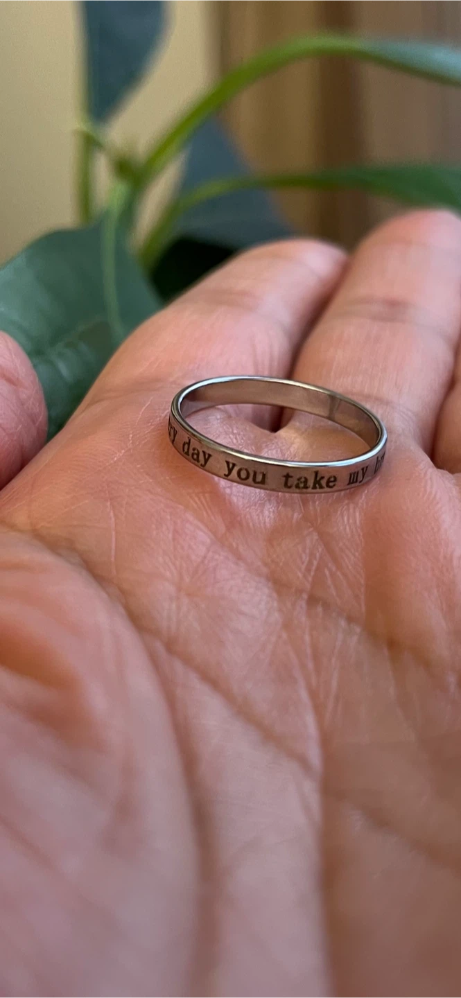 Stainless steel band ring with engraved text. Sz 8