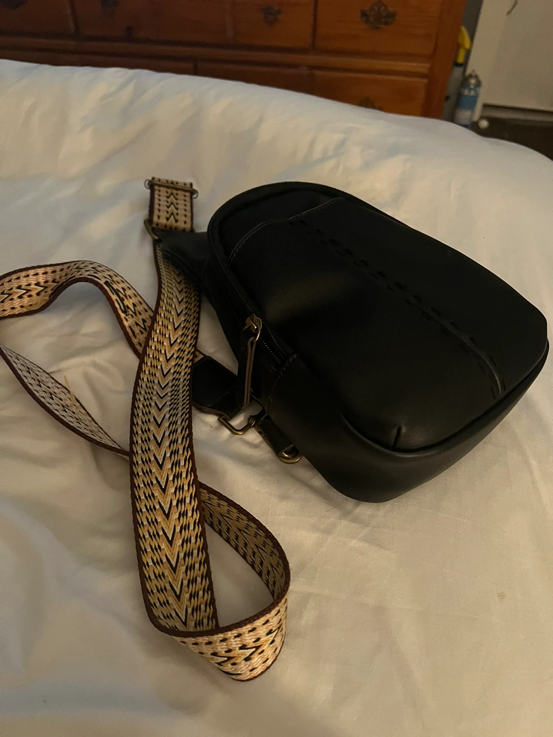 Black Faux Leather Crossbody Bag with Patterned Strap