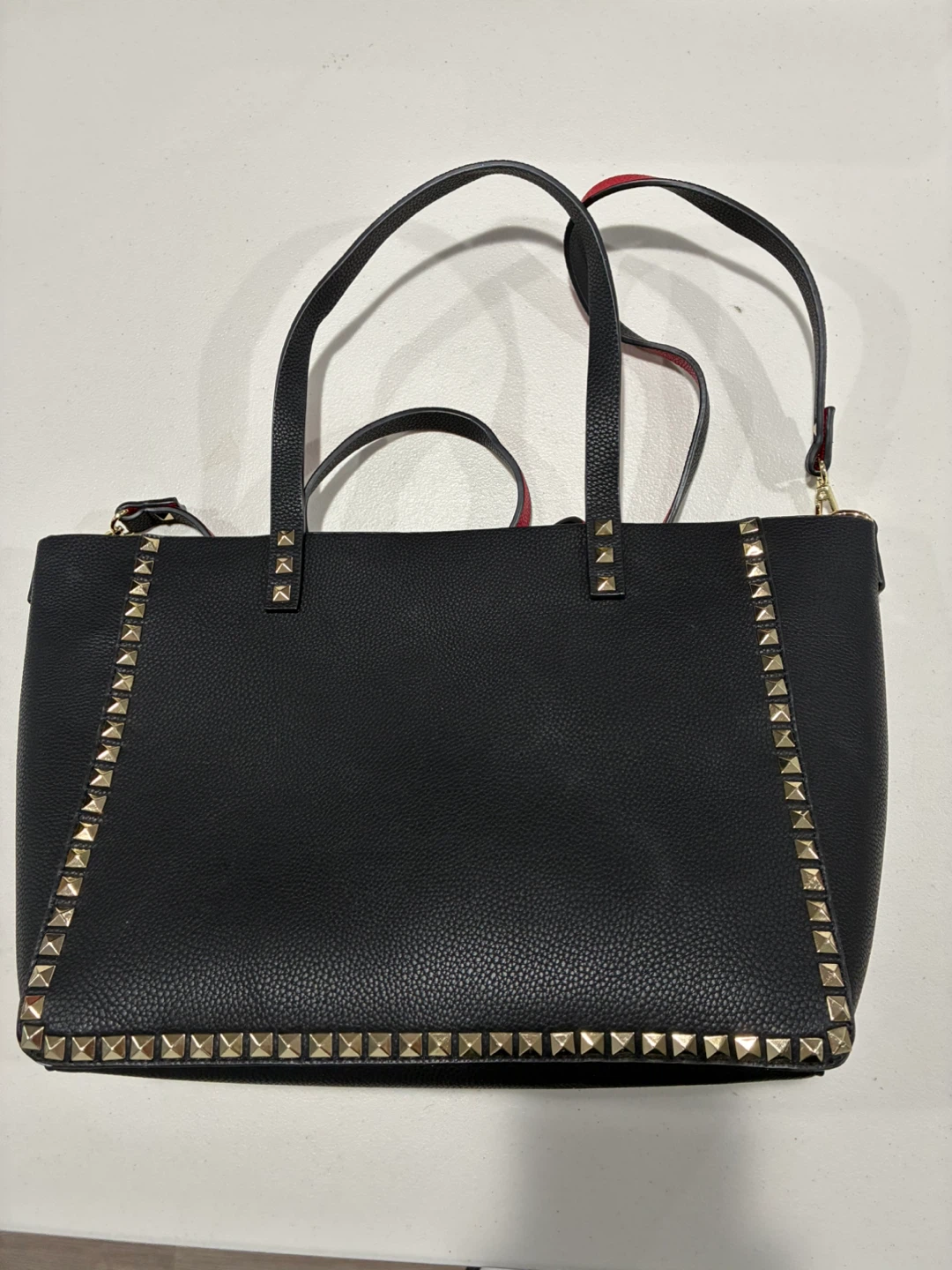 Black Tote Bag with Red Interior and Stud Detail