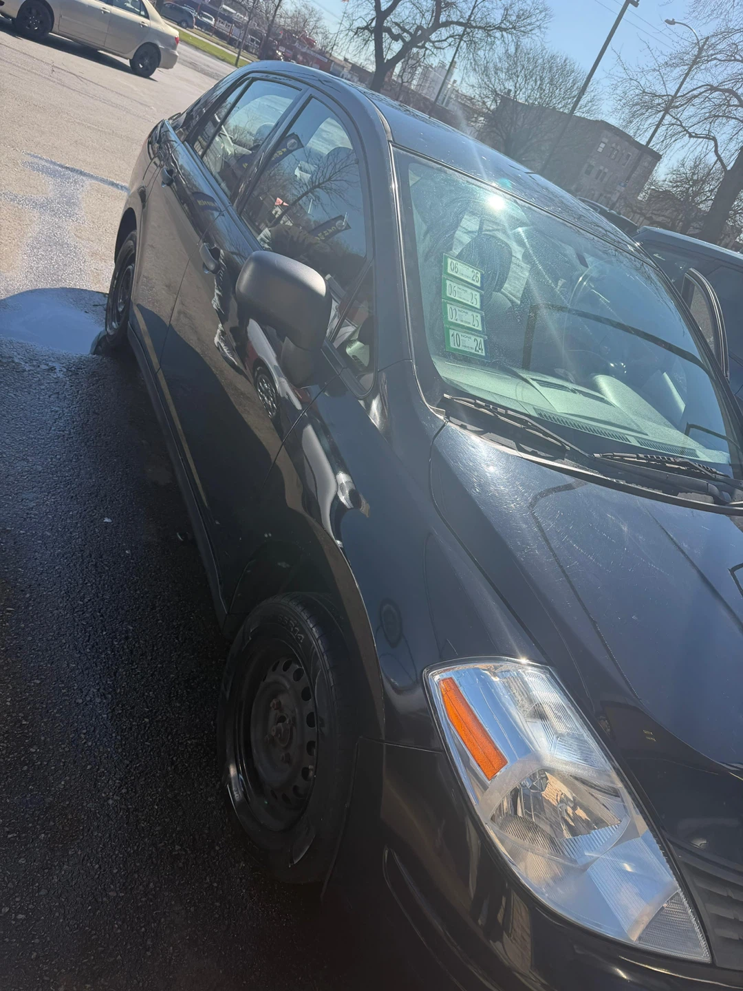 Black Nissan Versa Sedan