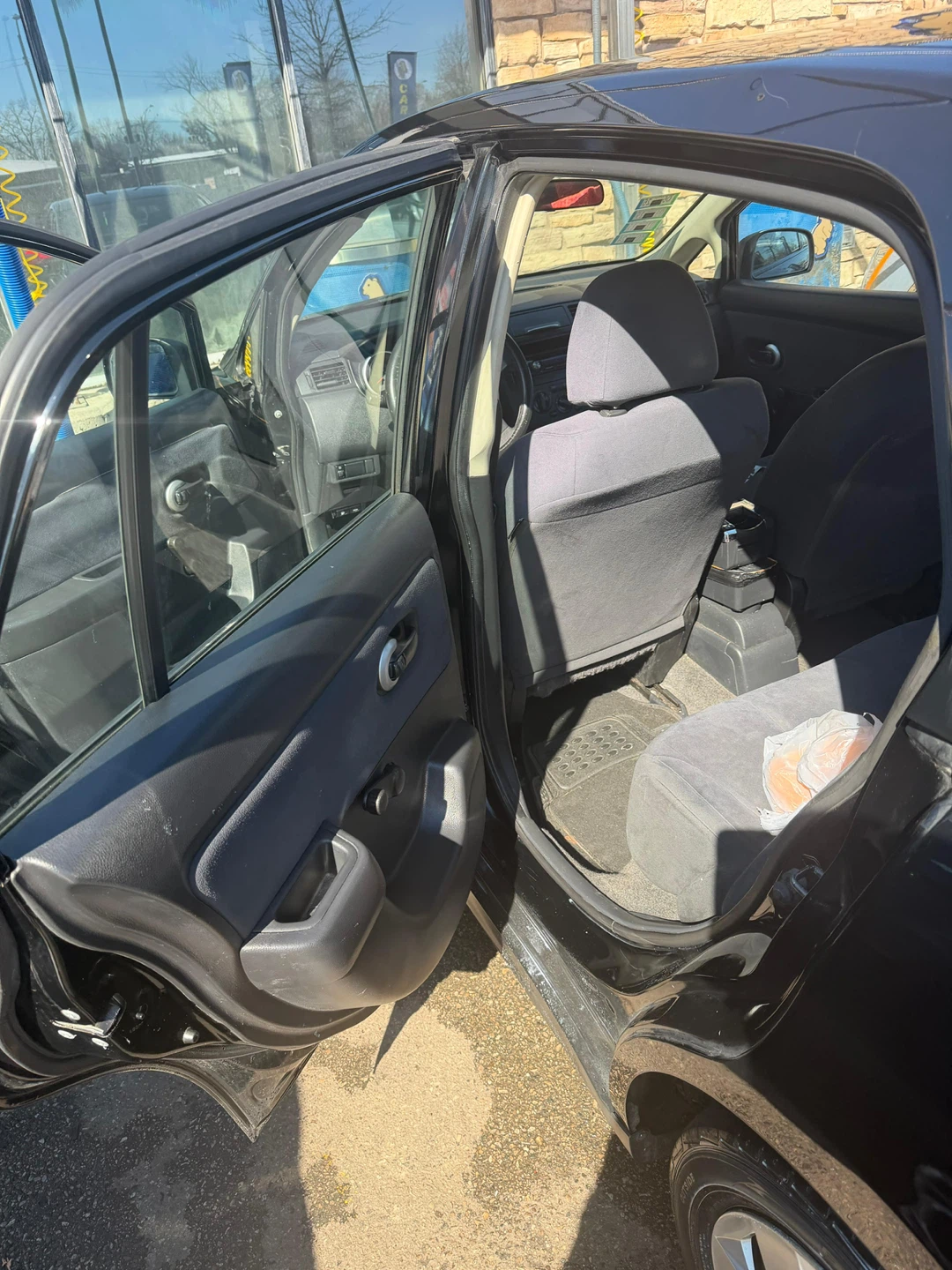Black Nissan Versa Sedan - photo 2