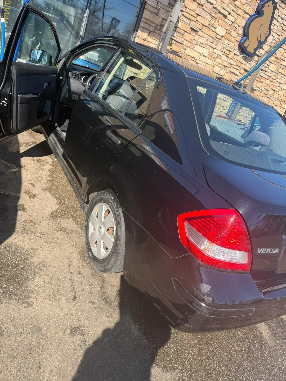 Black Nissan Versa Sedan - photo 3